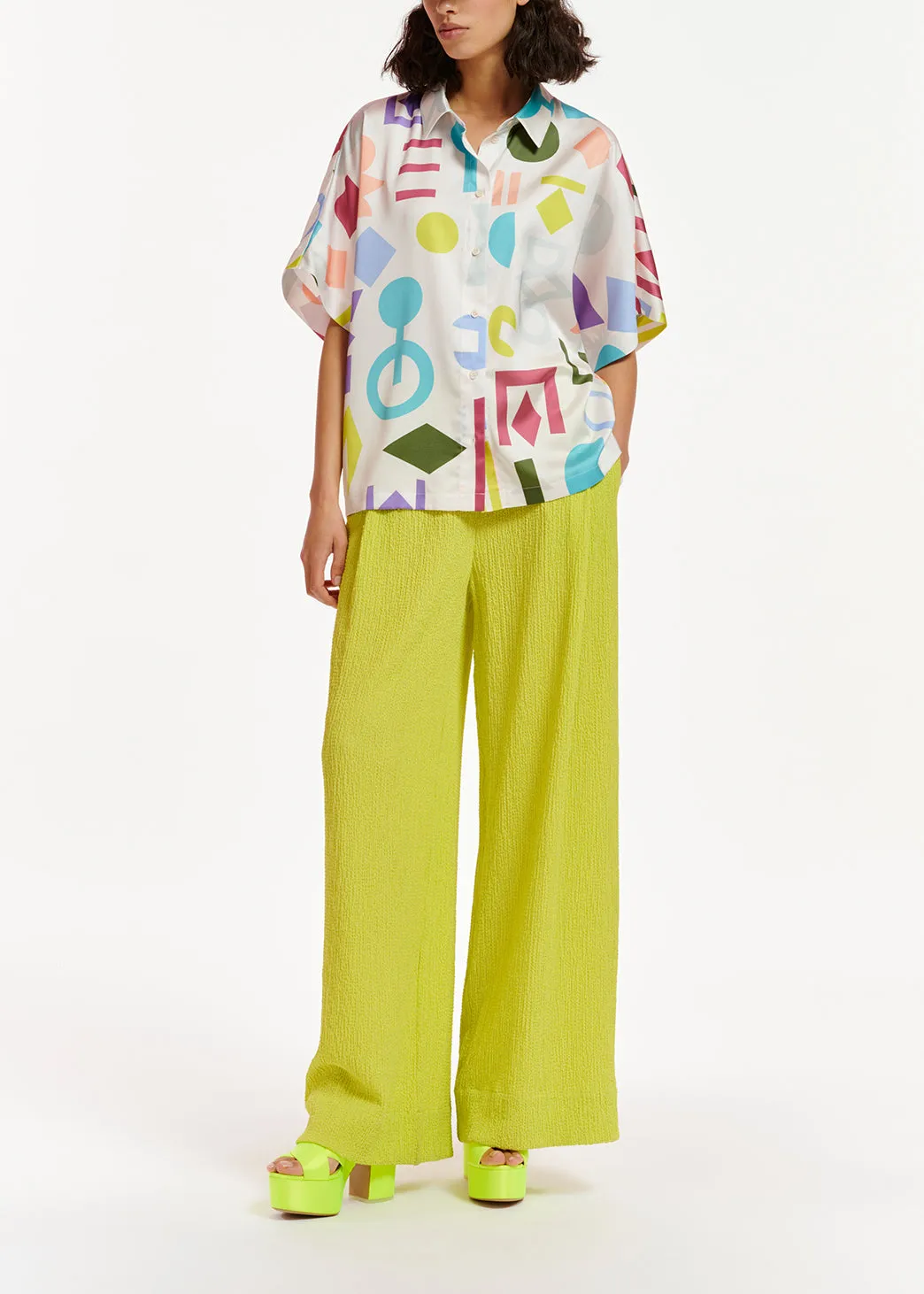 Lime green wide-leg seersucker pants