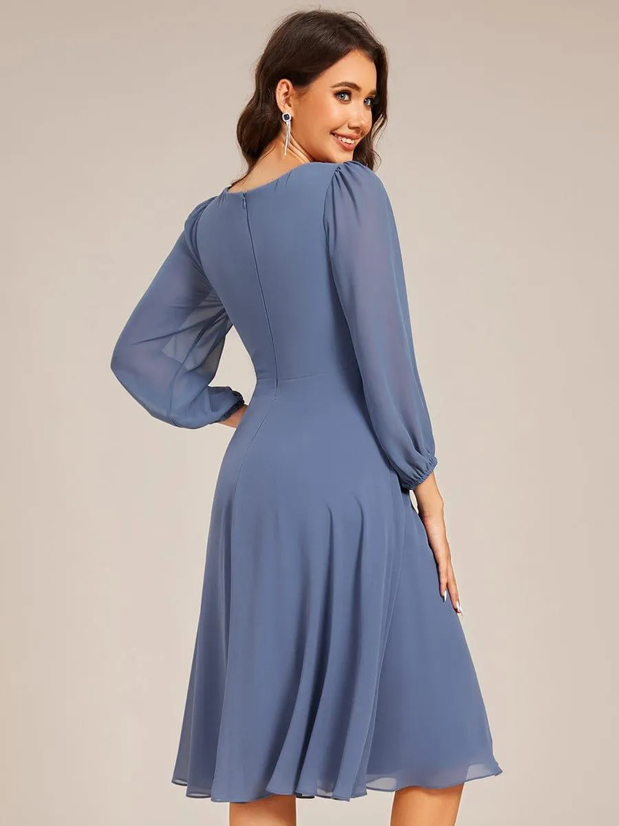 Robe d'invitée de mariage mi-longue plissée à manches longues en mousseline de soie